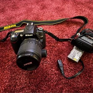 Nikon Black Digital SLR Camera with Yellow Accent Strap D90